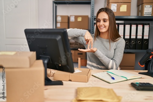 Young blonde woman ecommerce business worker having online deaf language conversation at office