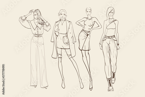 Set of young beautiful women in stylish clothes. Sale concept. Hand-drawn fashion illustration. Fashion sketch.