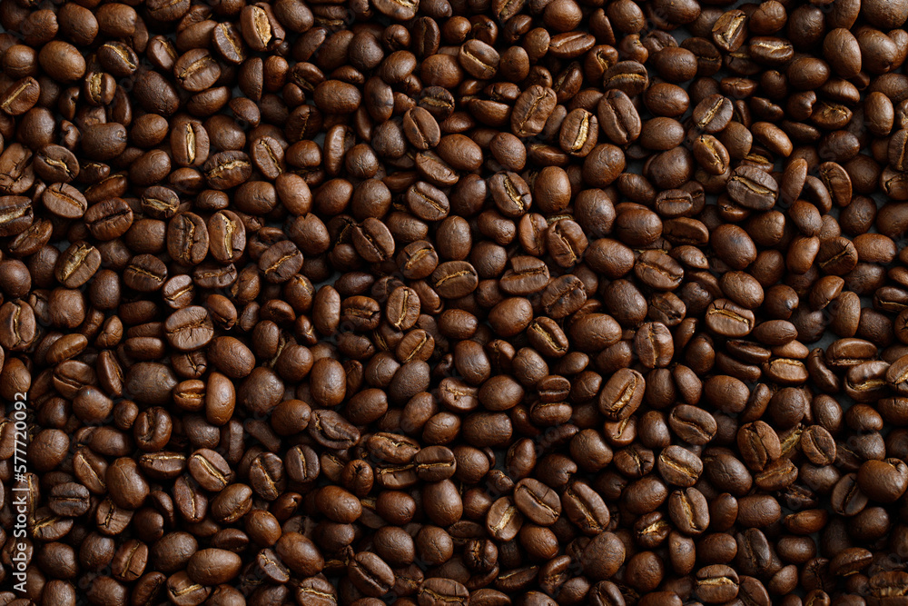 photo macro close up texture of roasted coffee beans dark, can be used as a background. photo macro close up texture of roasted coffee beans dark, can be used as a background.