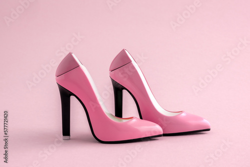 Pink shoes on a pink background. Minimal art poster.
