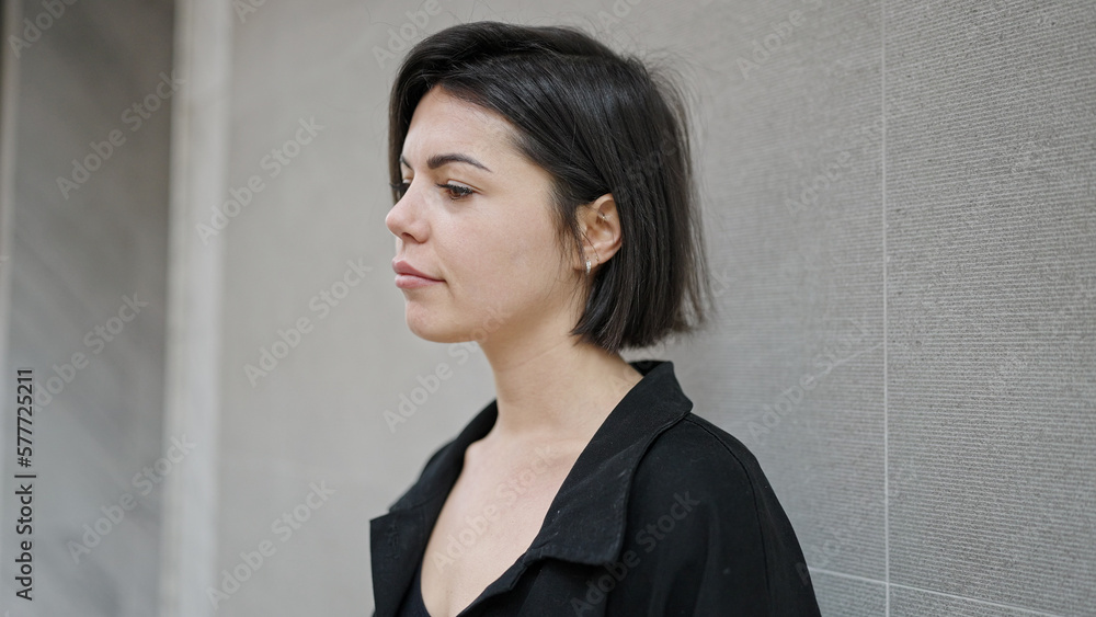 Young caucasian woman standing with serious expression over isolated white background Young caucasian woman standing with serious expression over isolated white background