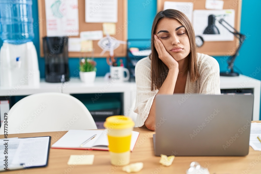 Young beautiful hispanic woman business worker boring working at office Young beautiful hispanic woman business worker boring working at office