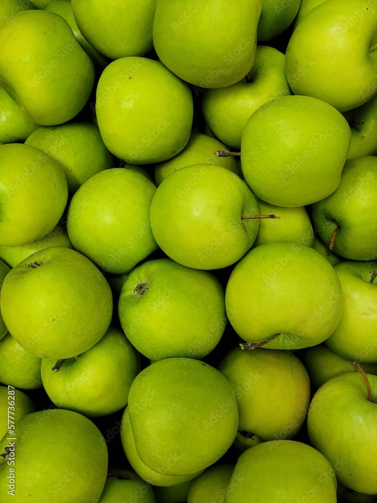 Green apples background. ecological Apples in the supermarket. Green apples background. ecological Apples in the supermarket.