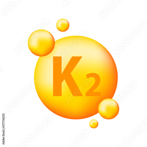 Vitamin K2 with realistic drop. Particles of vitamins in the middle.