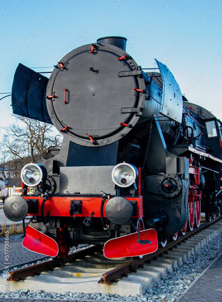 Fototapeta premium Historic old locomotive on the tracks