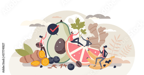 Organic superfood and ecological essential nutrients tiny person concept, transparent background. Healthy diet with avocado, vegetables, fruits and roots for wellbeing or body health illustration.