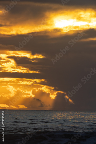 Landscape of dark sea at yellow sunset