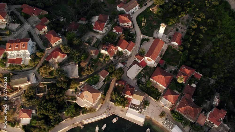 Seaside town in Greece. Aerial view of the seaside town on a sunset. Seaside town in Greece. Aerial view of the seaside town on a sunset.