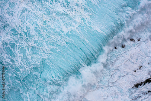 Shore surf wave foam and rough sea