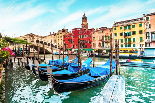 magical landscape with gondolas and boats on the Grand Canal in Venice, Italy. popular tourist attraction. Wonderful exciting places.