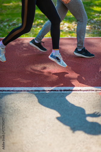 Legs of two people jogging © qunica.com