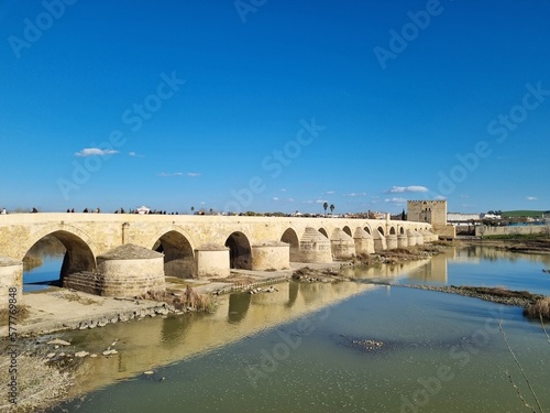 Cordoba, Spain  28th February 2023: the Roman bridge in Cordoba © Laura