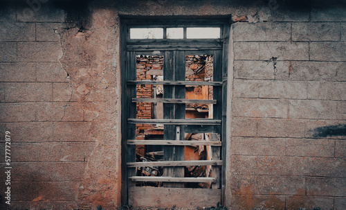 Fotografie Old abandoned building and ruined doors and windows in an old Aegean town in autumn