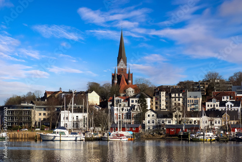 Flensburg, Germany - 03 March 2023: View of the historic harbour of Flensburg with some ships. photo