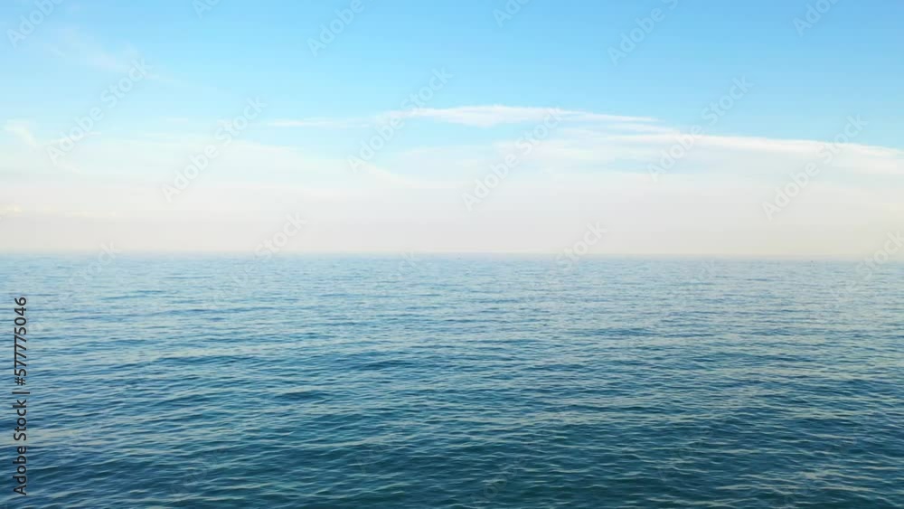 Seascape background with sea horizon and clear deep blue sky Seascape background with sea horizon and clear deep blue sky