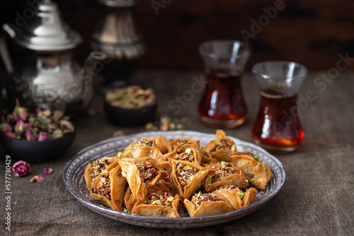 Traditional Arabic dessert Baklava with nuts and sweet syrup.	