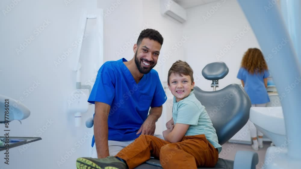 Liitle boy during dentist examination, looking at camera. Liitle boy during dentist examination, looking at camera.