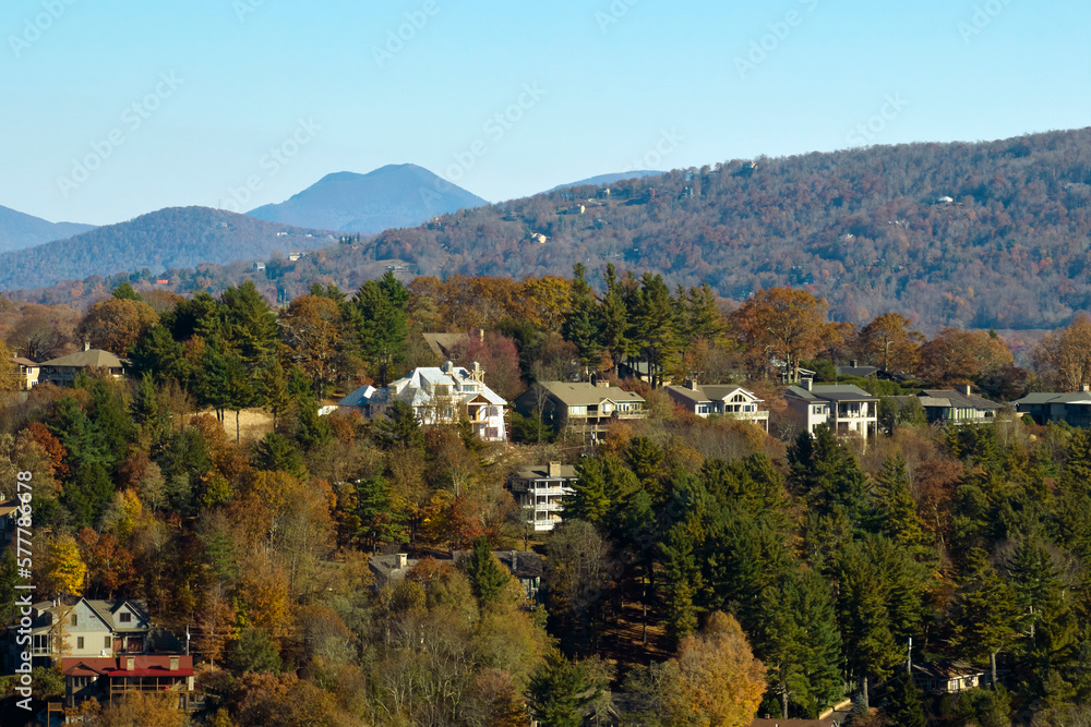 Aerial view of expensive american homes on hilltop in North Carolina mountains residential area. New family houses as example of real estate development in USA suburbs