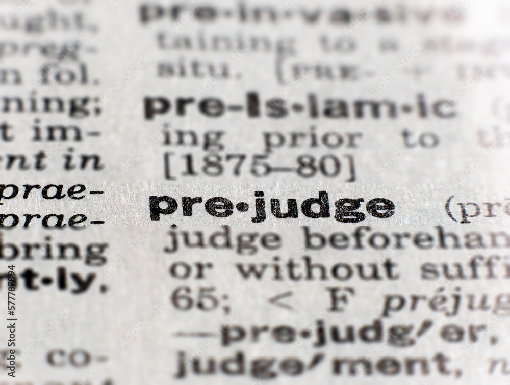 closeup of the word prejudge - obrazy, fototapety, plakaty 