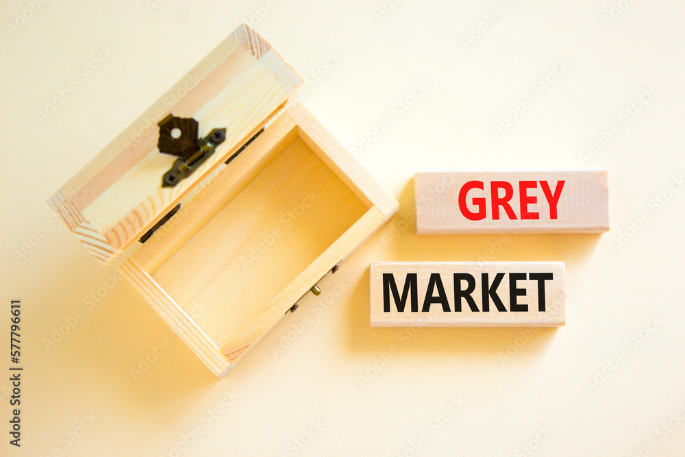 Grey market symbol. Concept words Grey market on wooden block. Beautiful white table white background. Empthy opened wooden chest. Business grey market concept. Copy space. Grey market symbol. Concept words Grey market on wooden block. Beautiful white table white background. Empthy opened wooden chest. Business grey market concept. Copy space.