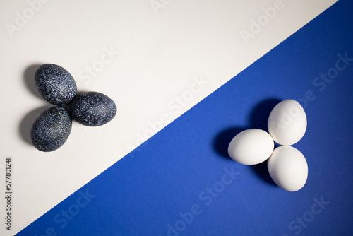 Easter eggs on a blue and white background. Background for Easter decoration. Easter eggs
