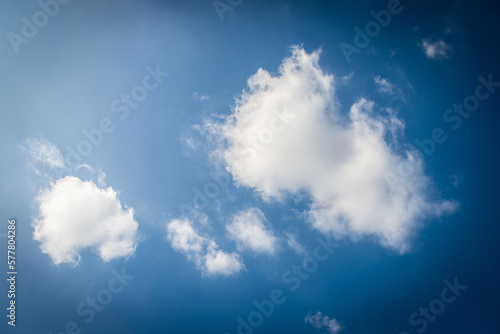 White fluffy clouds and blue sky