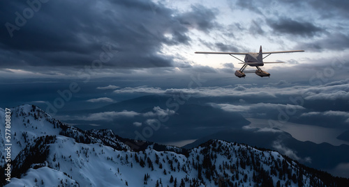 Single Engine Seaplane Flying over the Pacific Ocean West Coast. Adventure Composite. 3D Rendering Plane. Aerial Background from Howe Sound, British Columbia near Vancouver, Canada. Travel Concept