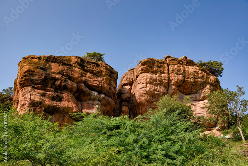 Red sandstone cliff at Badami in Karnataka, India