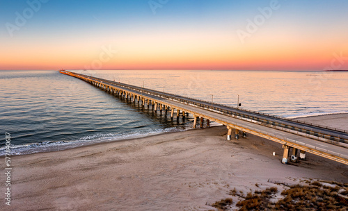 Aerial panorama of Chesapeake Bay Bridge Tunnel at sunset. CBBT is a 17.6-mile bridge tunnel that crosses the mouth of the Chesapeake Bay. photo