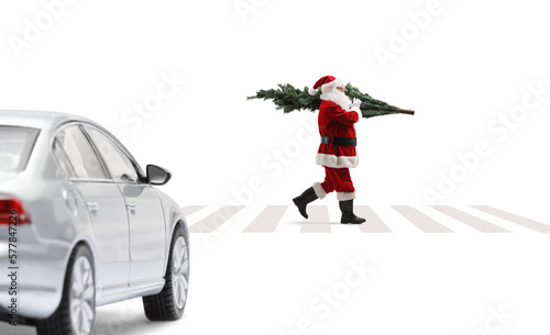 Car waiting for santa claus to cross a street on a pedestrian crossing