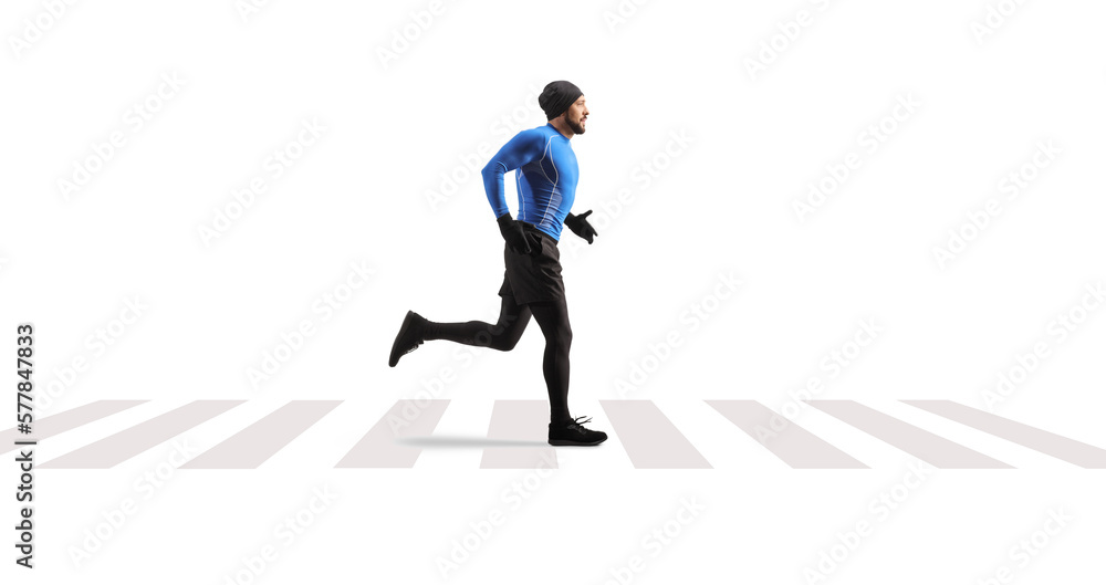 Male runner on a pedestrian crossing Male runner on a pedestrian crossing