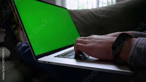 Mans hands of business woman. User worker using typing on laptop notebook keyboard. Sit at home sofa working online with pc. Technology concept. Close up side view. Video 4K.