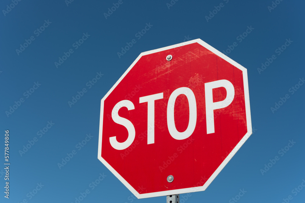stop sign on blue sky background stop sign on blue sky background