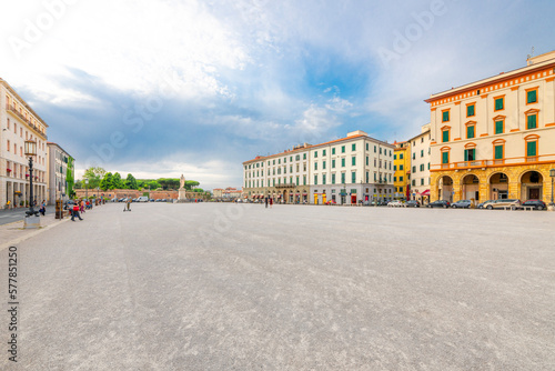 The spacious Piazza della Repubblica town square in the Tuscan coastal port town of Livorno, Italy, with the monument statue of Leopoldo II in view in the distance.