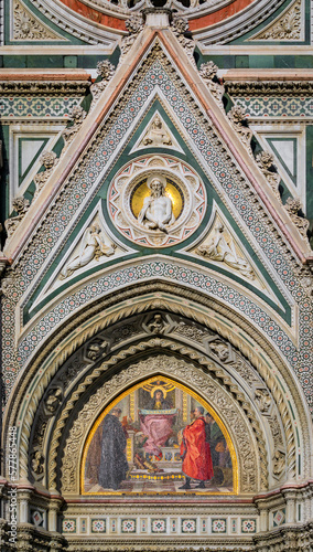 Ornate marble facade of the famous Duomo Cathedral in Florence, Italy