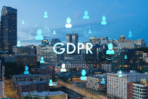 Seattle aerial skyline panorama of downtown skyscrapers at sunset, Washington USA. GDPR hologram, concept of data protection regulation and privacy for all individuals