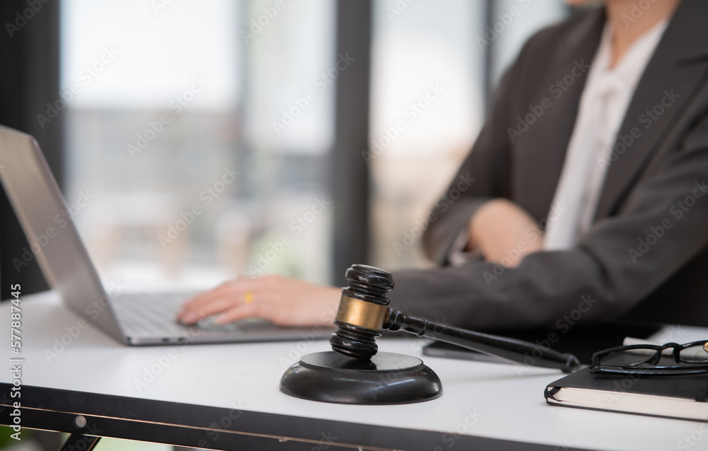Asian business woman working and talking at the office
