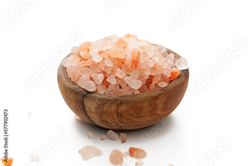 Bowl with pink himalayan salt isolated on white background