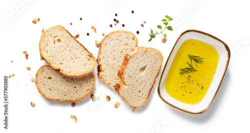 Valokuva Fresh bread slices with olive oil isolated on white background, top view