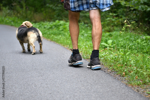 Joint hiking of a man and his best friend the dog