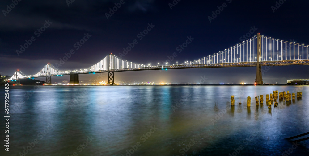 Fototapeta premium San Francisco Bay Bridge lights the dey before they turn off on March 5th, 2023