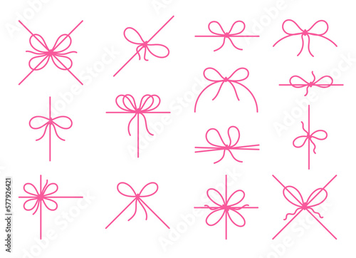 Set of red bows with a ribbon on white background. Decorative holiday decorations for packaging, cards, gifts.