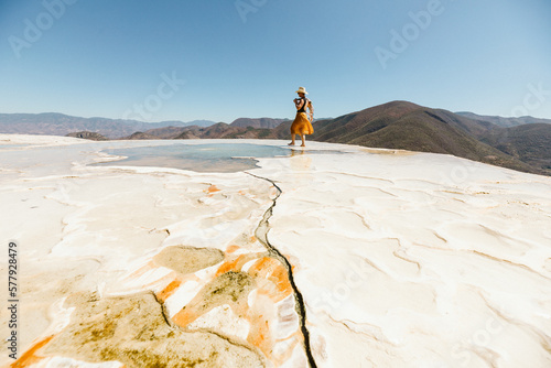 tourist walks in the hot springs at hierve del agua oaxaca mexico photo