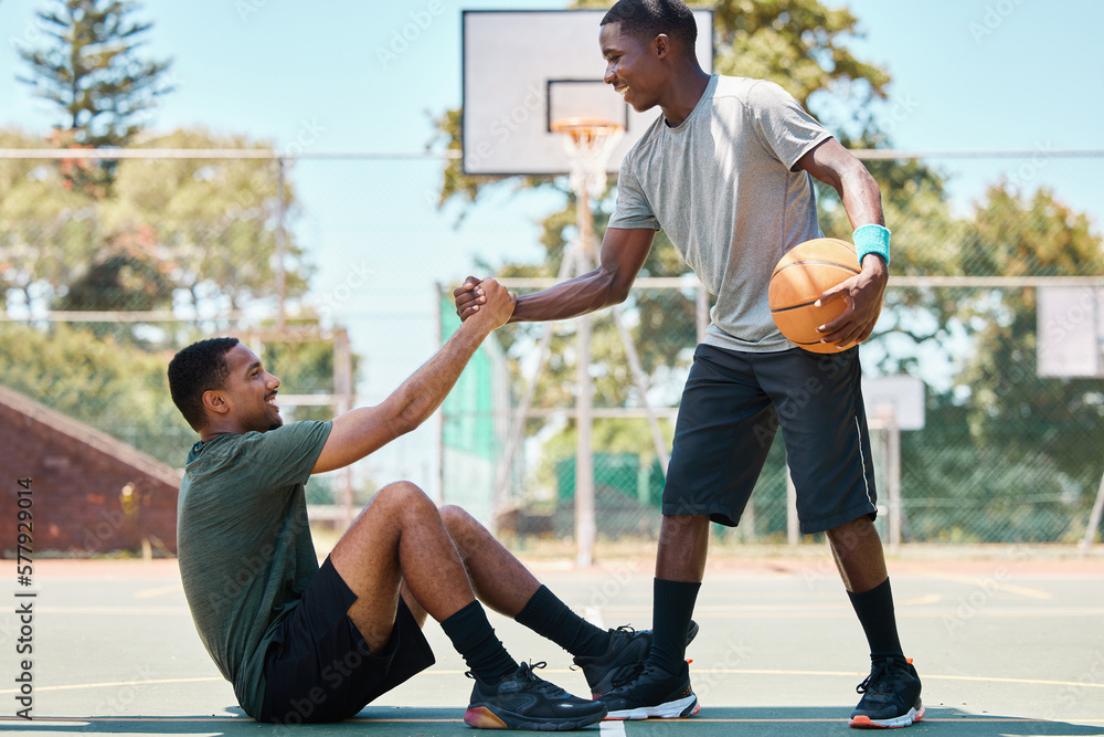 Basketball, sports and teamwork, helping hand and support, respect and assistance in competition training games. Happy basketball player holding hands with friend, trust and kindness on outdoor court - obrazy, fototapety, plakaty 