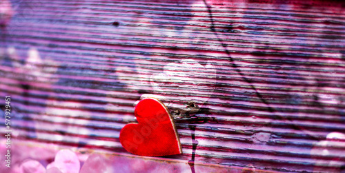 Fototapeta Naklejka Na Ścianę i Meble -  a heart and flowers on a pink background for women