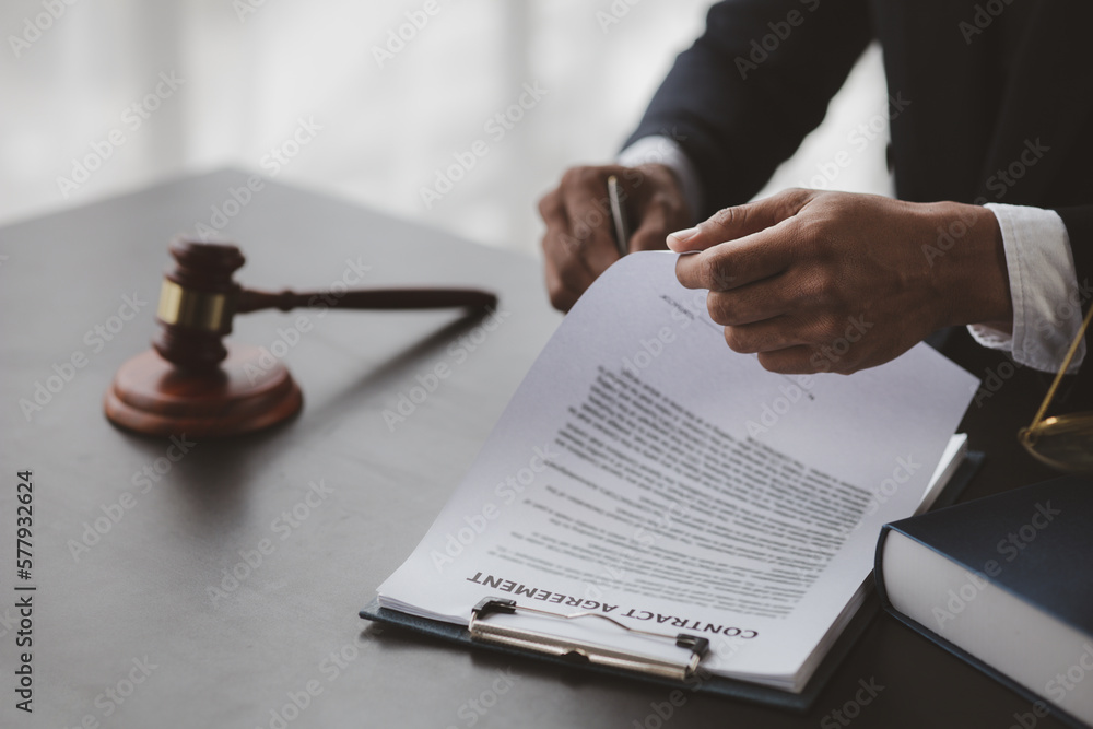 Attorneys or lawyers are advising clients in defamation cases, they are collecting evidence to bring charges against the parties for damages. The concept of defamation case counseling. - obrazy, fototapety, plakaty 