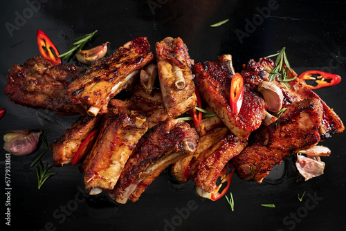 grilled ribs with vegetables and herbs photo