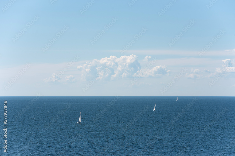 Sailboats at sea on a beautiful sunny day
