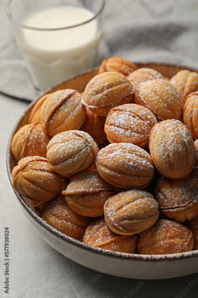 Bowl of delicious nut shaped cookies on grey table, closeup Bowl of delicious nut shaped cookies on grey table, closeup