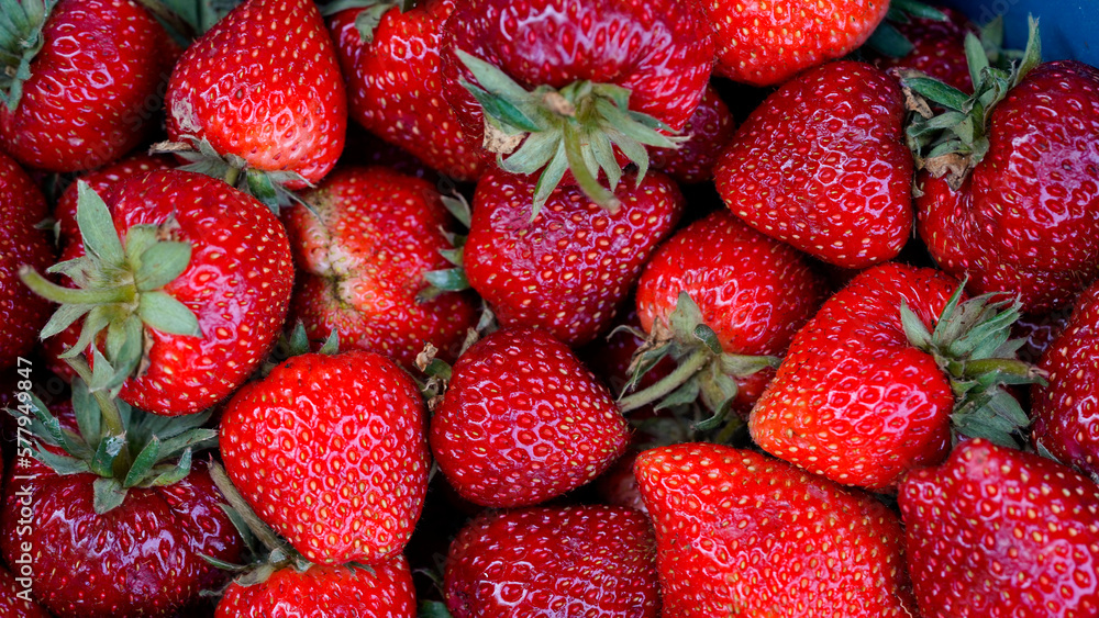 background from freshly harvested strawberries, directly above background from freshly harvested strawberries, directly above